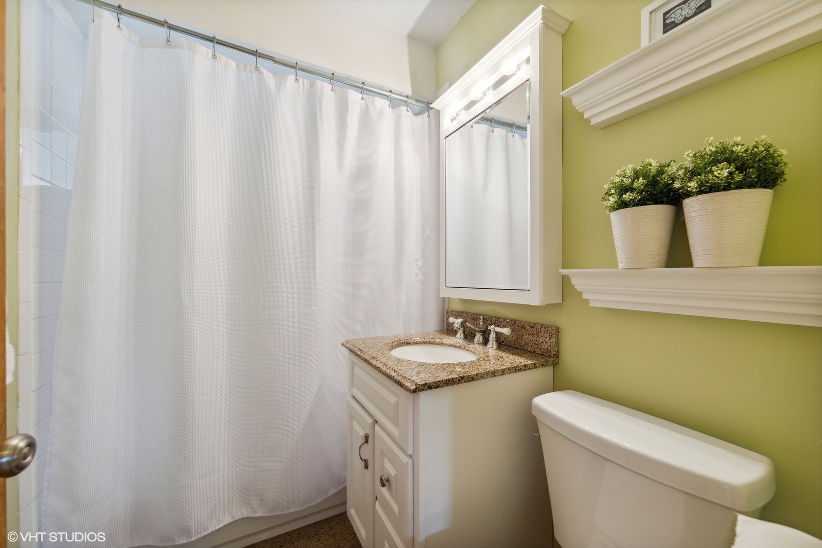 186 West Burlington Street Riverside, IL 60546 - Photo 14 of 19 a bathroom with a granite countertop sink and a mirror