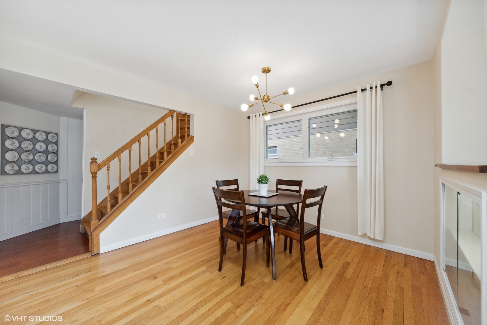 186 West Burlington Street Riverside, IL 60546 - Photo 5 of 19 a view of a dining room with furniture and wooden floor