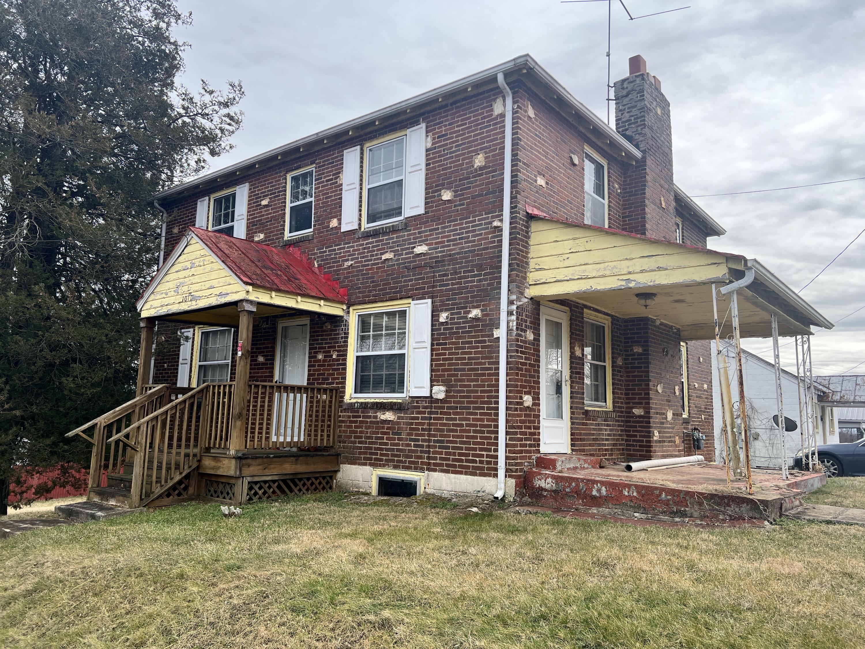 1011 Roundabout Road Martinsville, VA 24112 - Photo 2 of 17 a view of a house with a yard porch and wooden floor