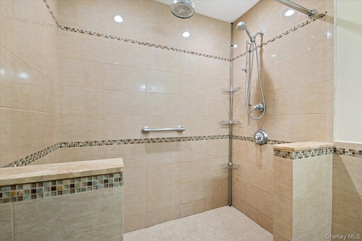 33 Fleets Cove Road Huntington, NY 11743 - Photo 32 of 42 Bathroom featuring tiled shower
