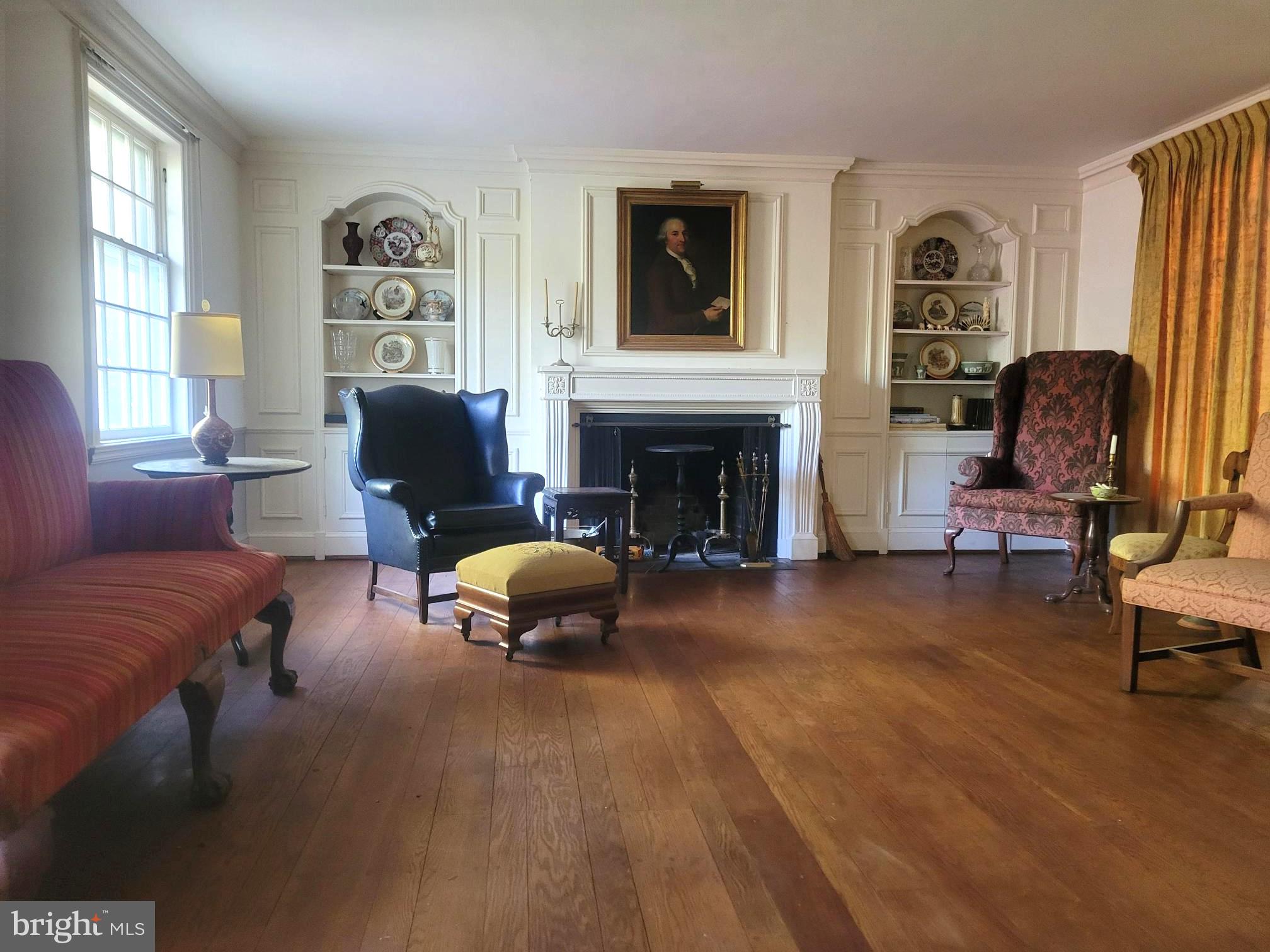 5211 Springlake Way Baltimore, MD 21212 - Photo 13 of 18 Wood burning fireplace flanked by built ins