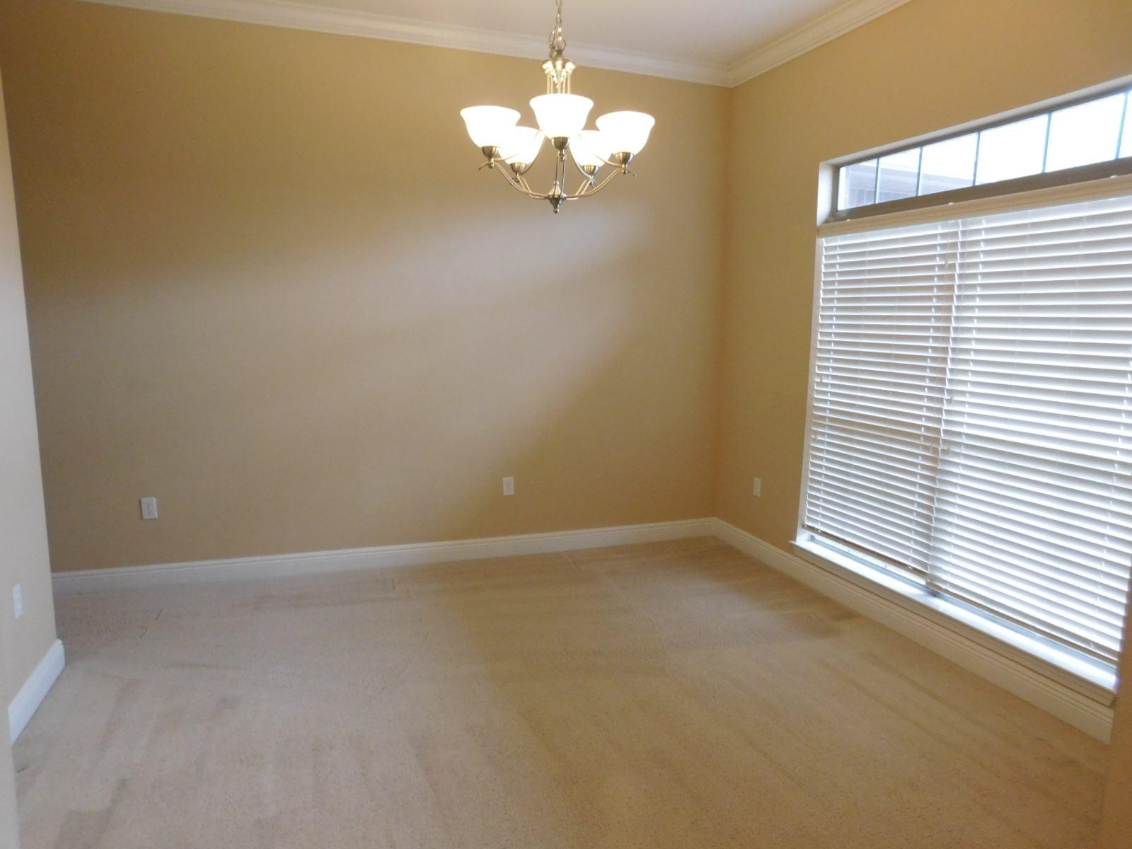 721 Lime Lane Crestview, FL 32536 - Photo 12 of 27 a view of an empty room with a window