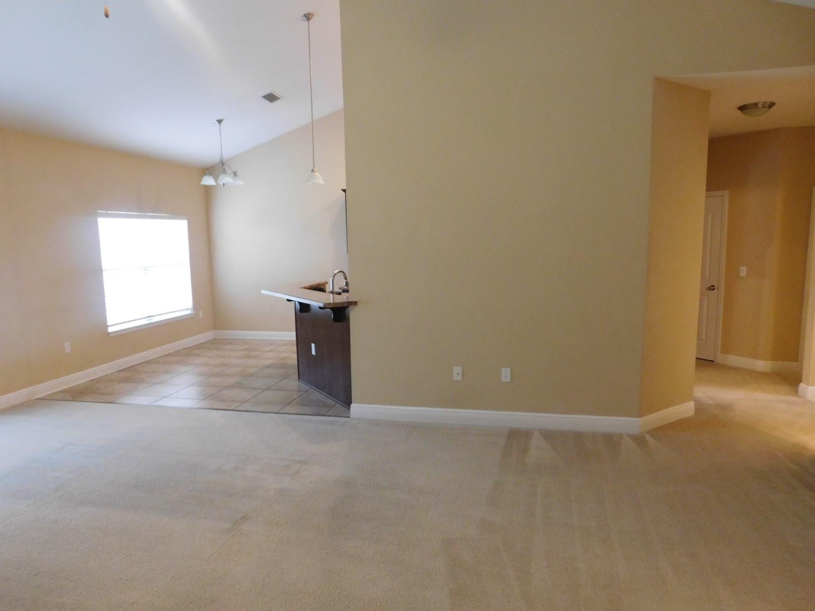 721 Lime Lane Crestview, FL 32536 - Photo 15 of 27 an empty room with windows and closet
