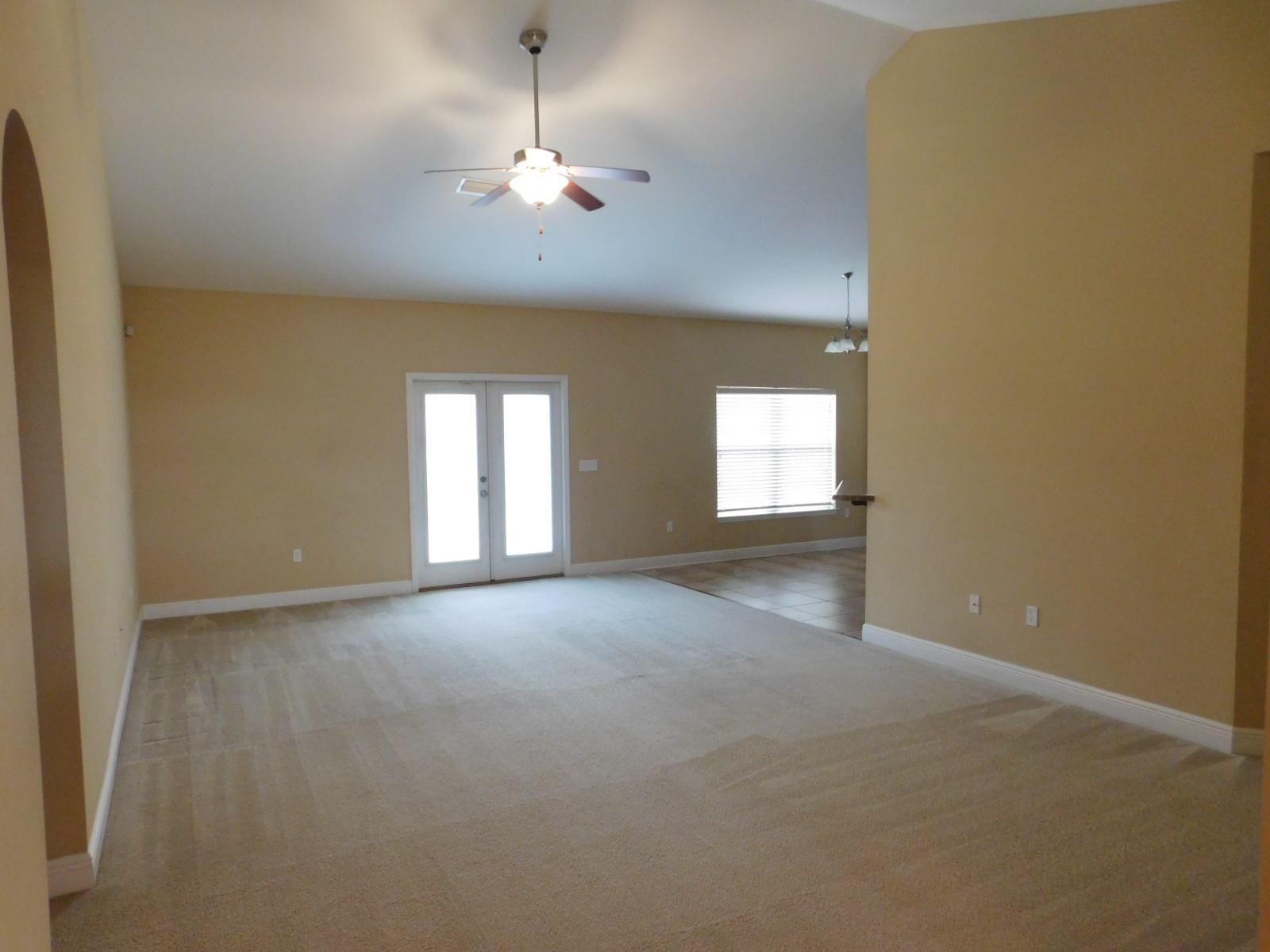 721 Lime Lane Crestview, FL 32536 - Photo 10 of 27 a view of an empty room with a window
