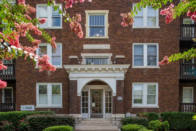 a bedroom with furniture and a table