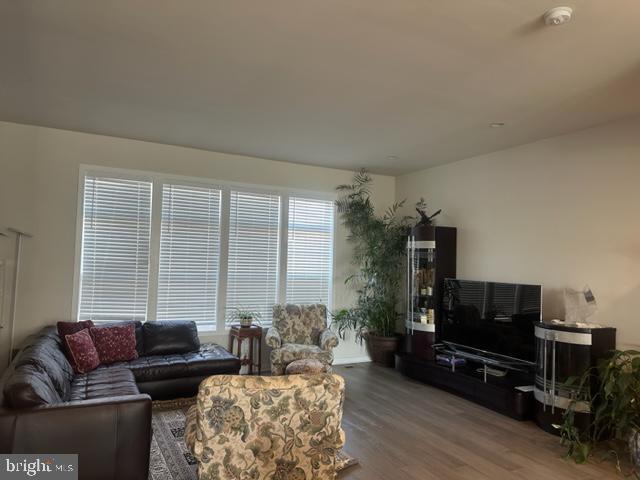 1708 Anderson Road McLean, VA 22102 - Photo 5 of 13 a living room with furniture and a flat screen tv