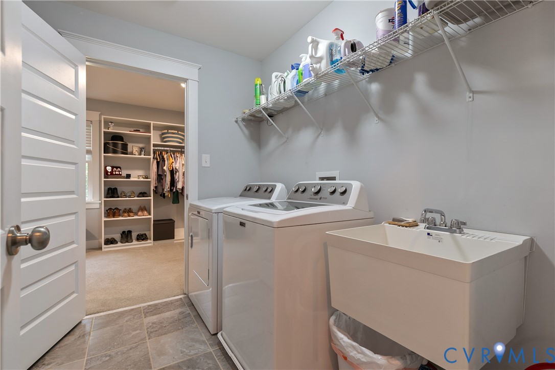 9749 Hoke Brady Road Henrico, VA 23231 - Photo 33 of 53 a room with a cabinets and washer dryer
