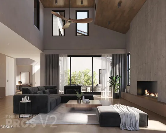 a living room with furniture fireplace and window