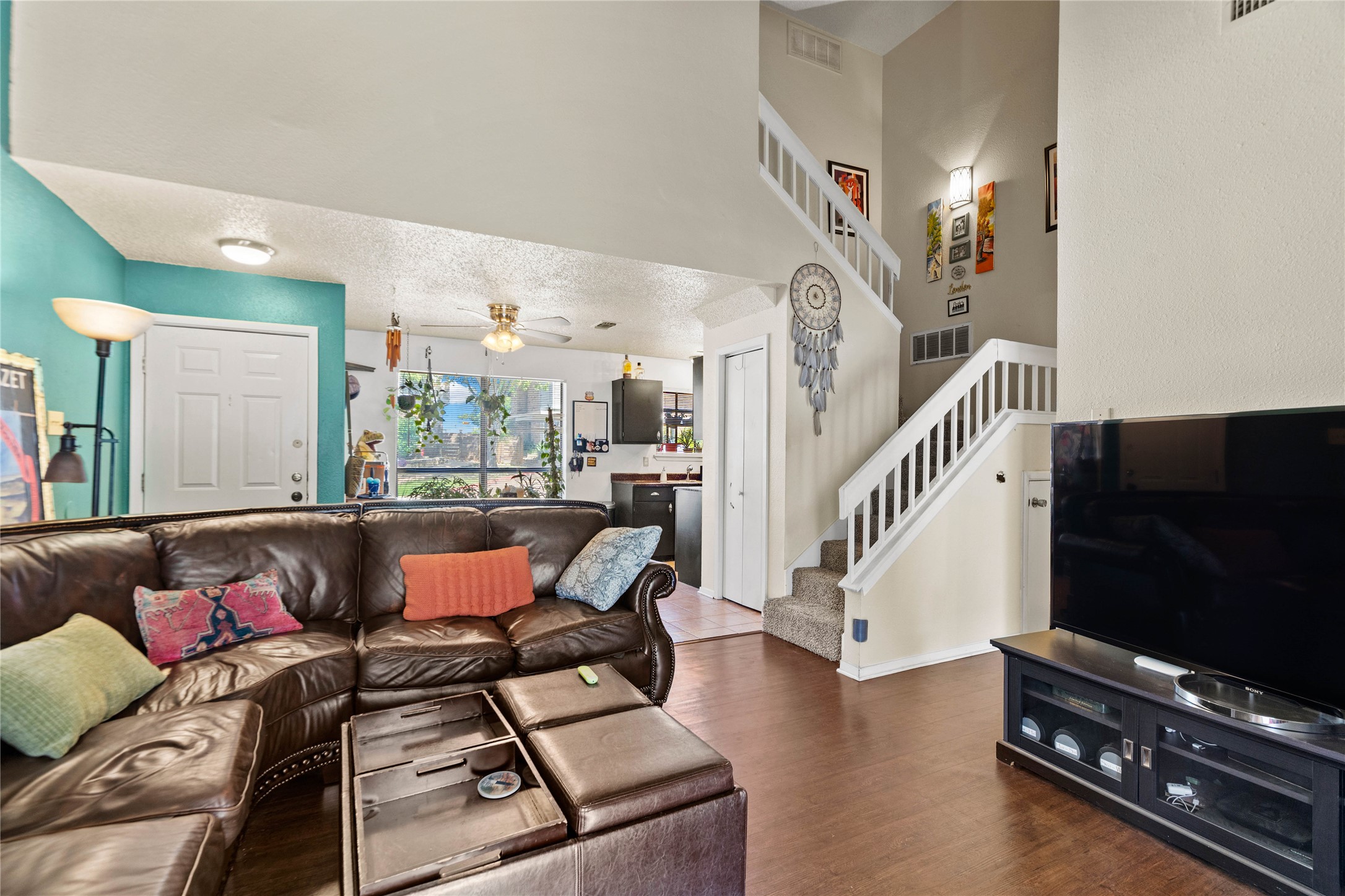 2018 West Rundberg Lane, Unit 4B Austin, TX 78758 - Photo 28 of 28 a living room with furniture and a flat screen tv