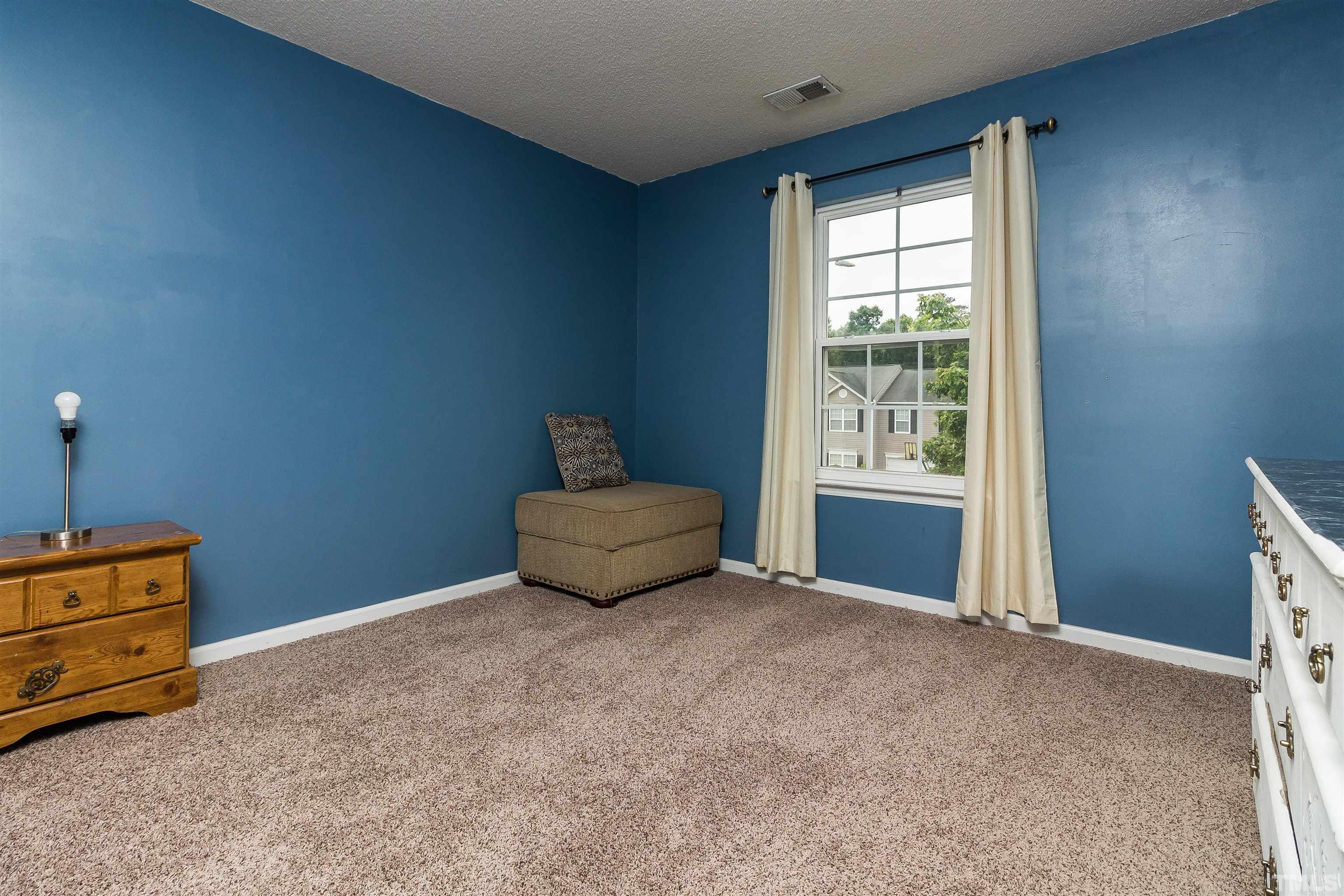 3305 Perkins Ridge Road Raleigh, NC 27610 - Photo 18 of 22 a view of an empty room with window