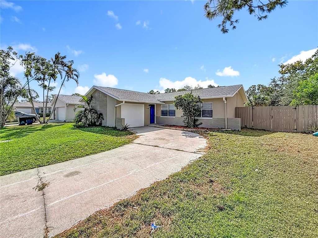 7480 118th Terrace Largo, FL 33773 - Photo 11 of 49 a house with garden in front of it