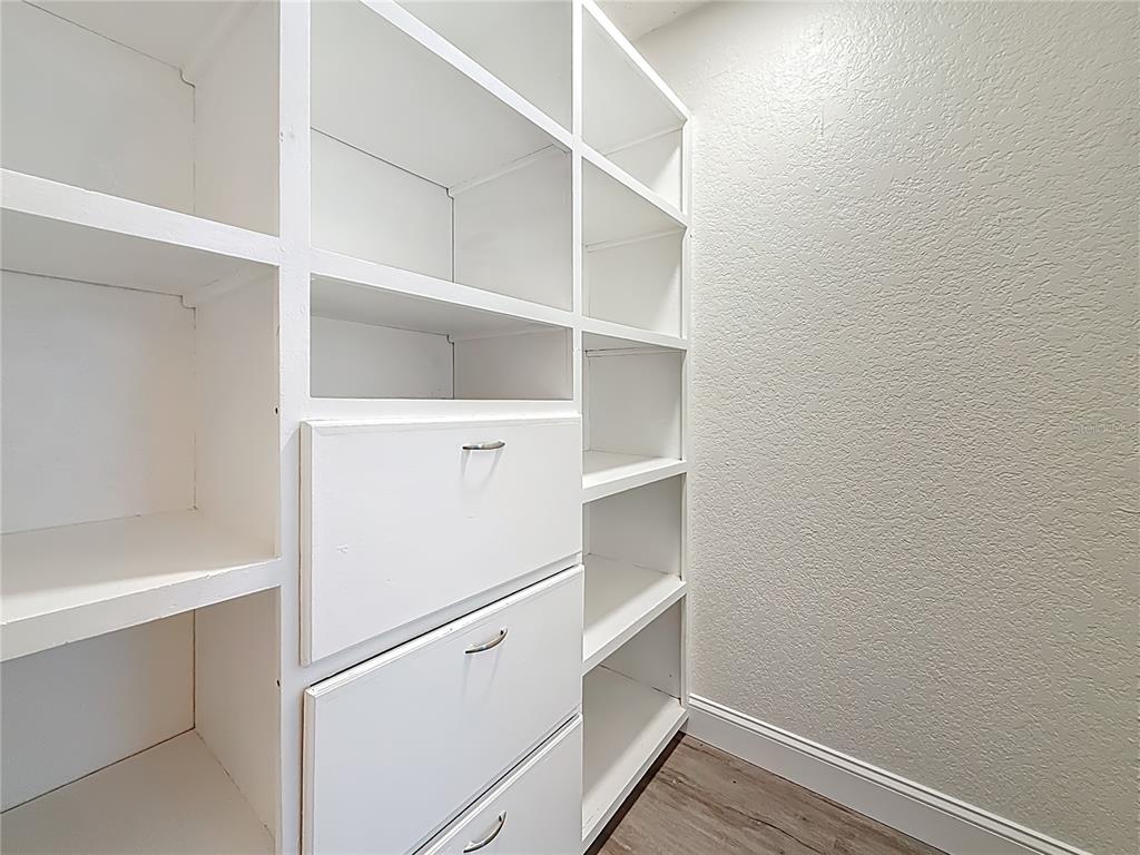 7480 118th Terrace Largo, FL 33773 - Photo 32 of 49 a view of an empty walk in closet