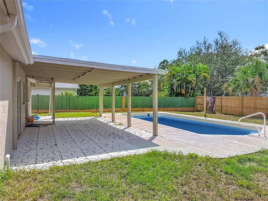 7480 118th Terrace Largo, FL 33773 - Photo 49 of 49 a view of backyard with trampoline