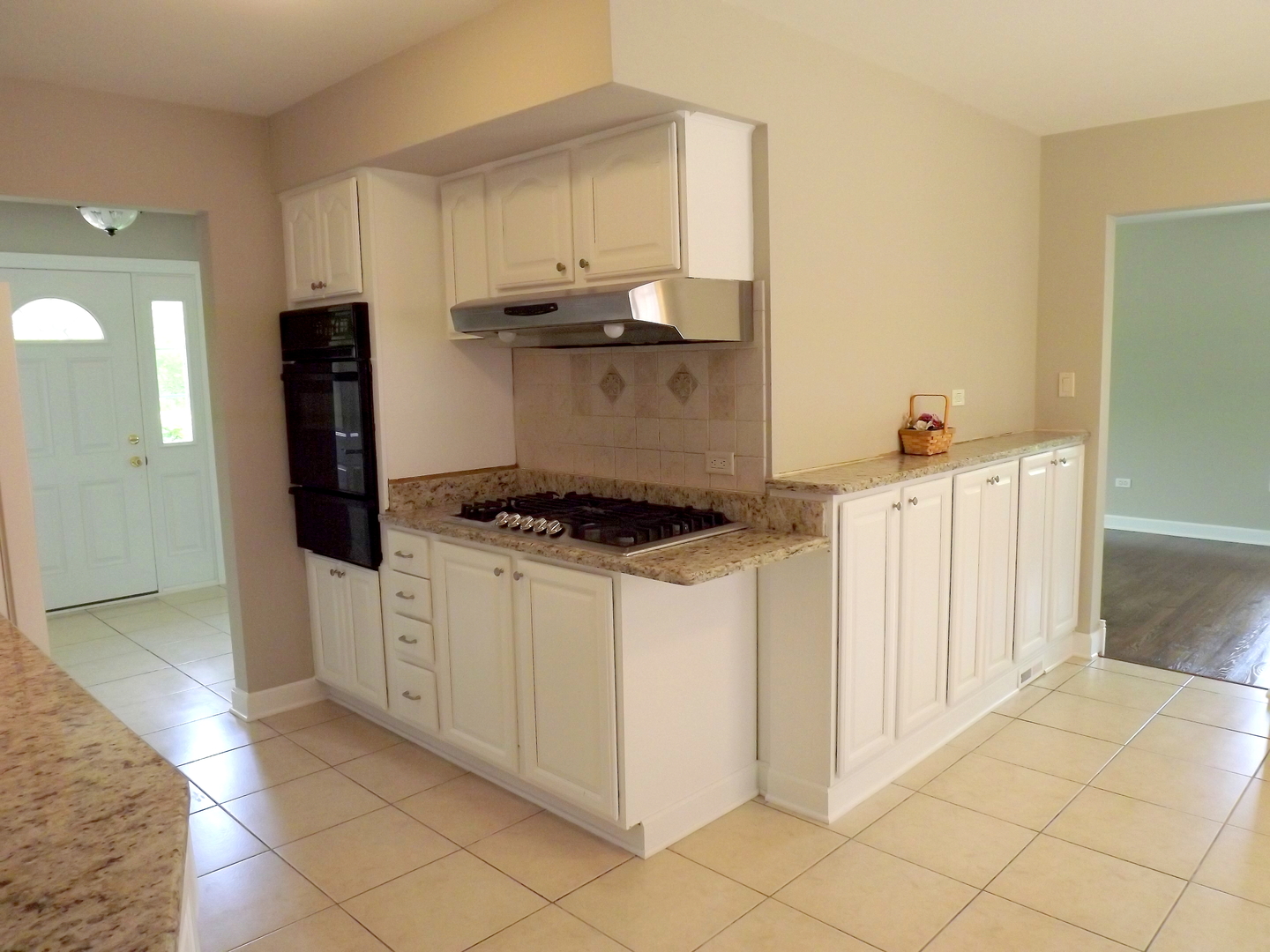 18056 Perth Avenue Homewood, IL 60430 - Photo 20 of 42 a kitchen with stainless steel appliances a refrigerator and a stove