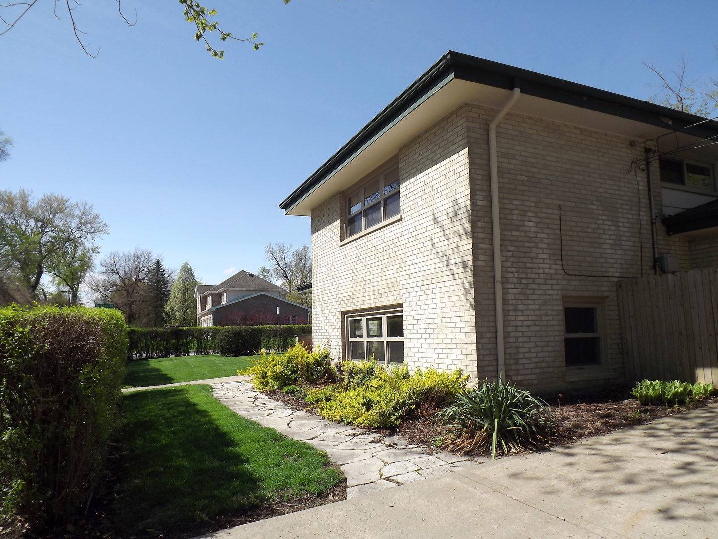 18056 Perth Avenue Homewood, IL 60430 - Photo 3 of 42 a front view of a house with garden