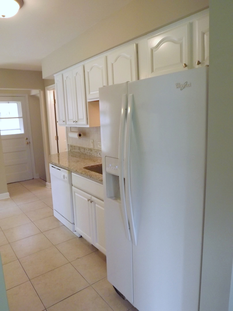 18056 Perth Avenue Homewood, IL 60430 - Photo 21 of 42 a bathroom with a granite countertop sink and a mirror