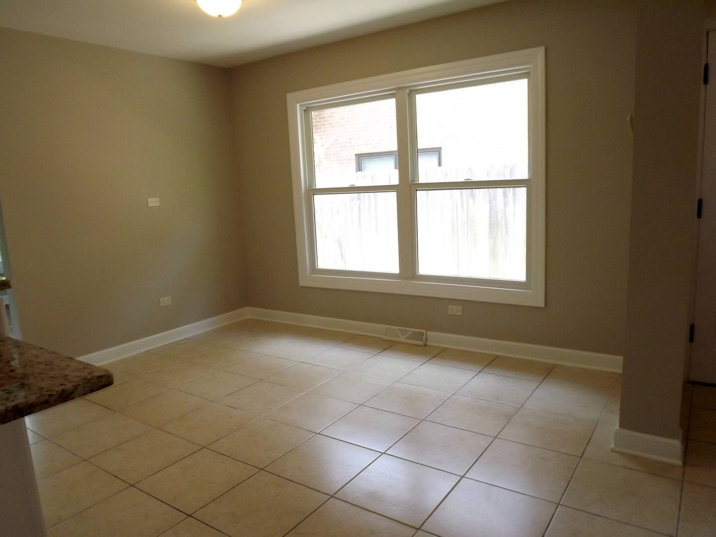 18056 Perth Avenue Homewood, IL 60430 - Photo 23 of 42 a view of an empty room with a window