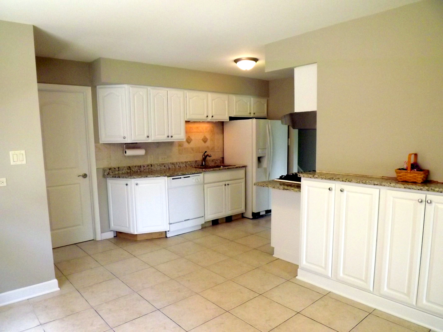 18056 Perth Avenue Homewood, IL 60430 - Photo 26 of 42 a kitchen with a sink cabinets and refrigerator