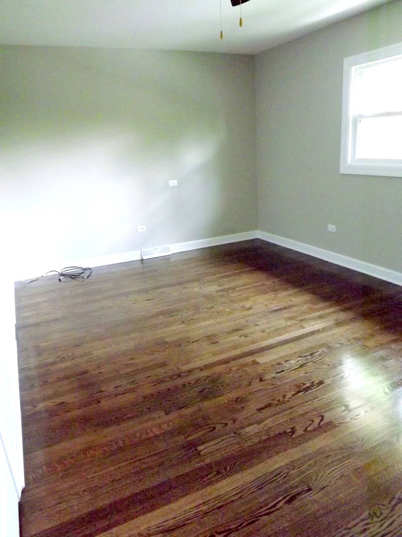 18056 Perth Avenue Homewood, IL 60430 - Photo 29 of 42 a view of empty room with wooden floor