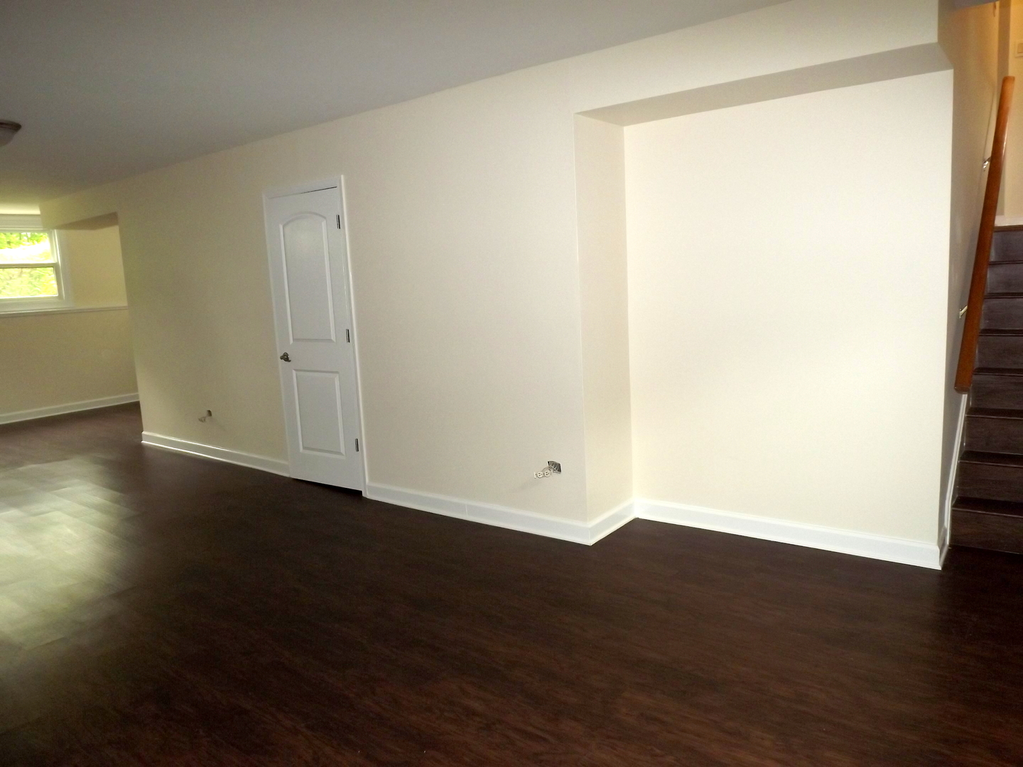 18056 Perth Avenue Homewood, IL 60430 - Photo 37 of 42 a view of an empty room with wooden floor and a window