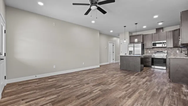 a view of kitchen with wooden floor