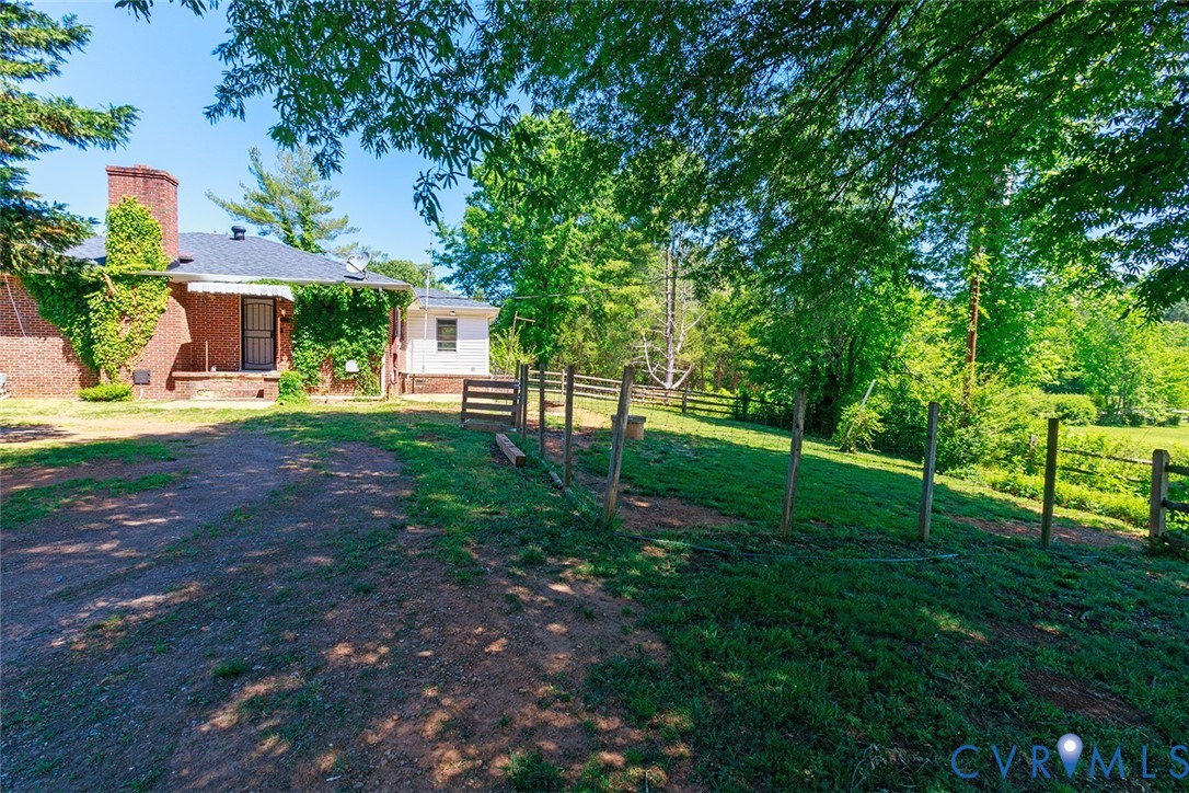 9903 Boze Road Ford, VA 23850 - Photo 39 of 45 a view of a house with backyard