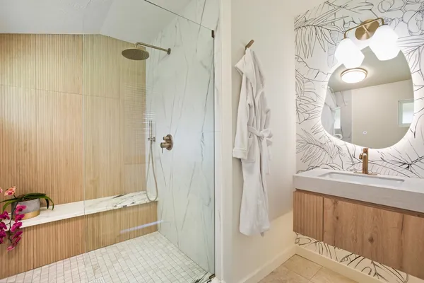 a bathroom with a sink and a mirror
