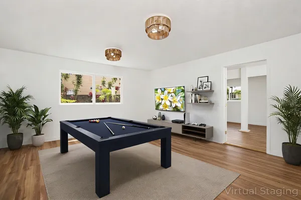 a view of a dining room with a wooden floor