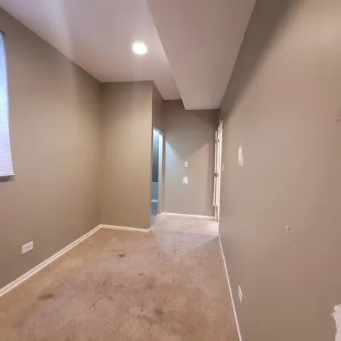 en empty room with windows