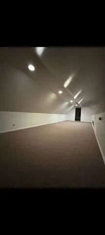 a kitchen with stainless steel appliances granite countertop a refrigerator and a refrigerator