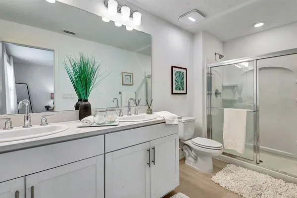 a room with a large window and chair