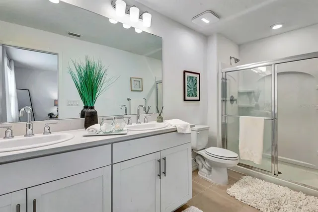 a room with a large window and chair