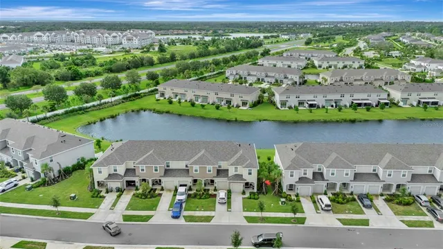 an aerial view of a house with a garden