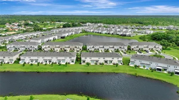 an aerial view of a house with a garden