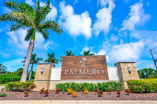 aerial view of a house with a yard and garden