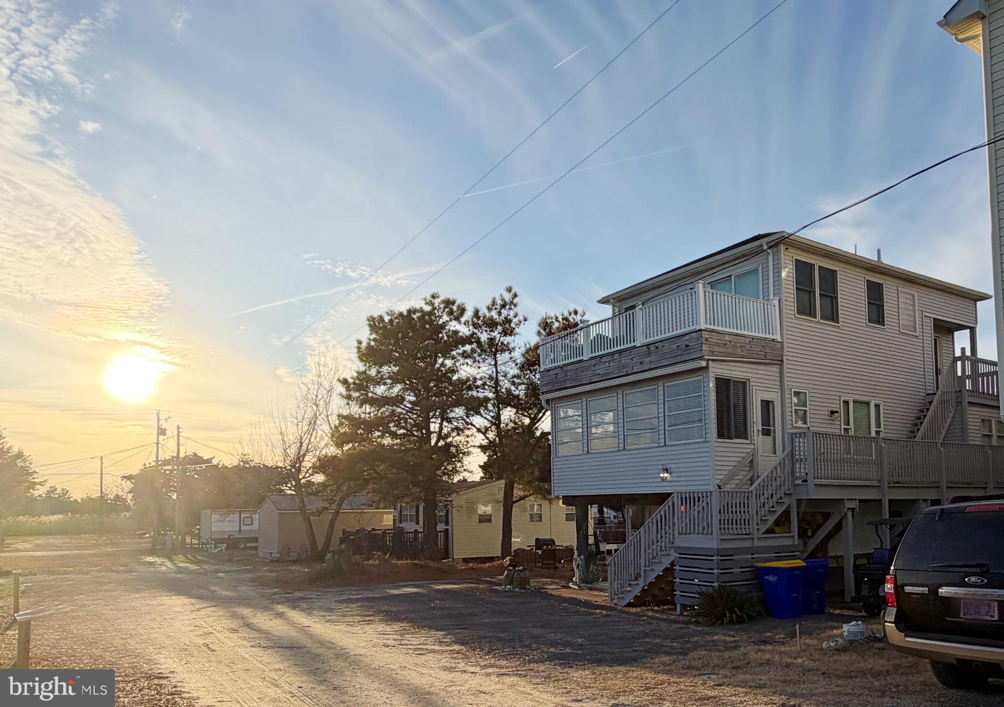 a view of a street with cars