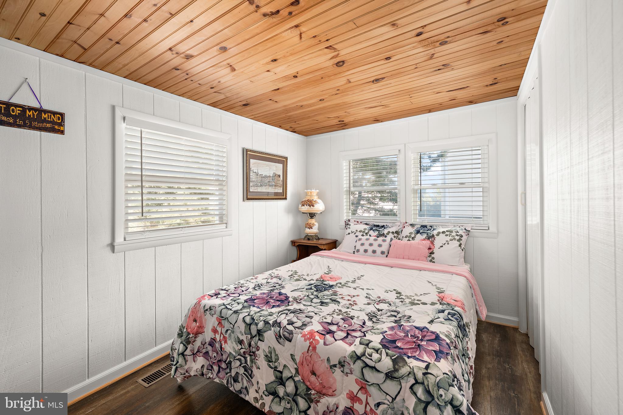 8 Virginia Avenue Milton, DE 19968 - Photo 12 of 50 a bedroom with a bed and a window