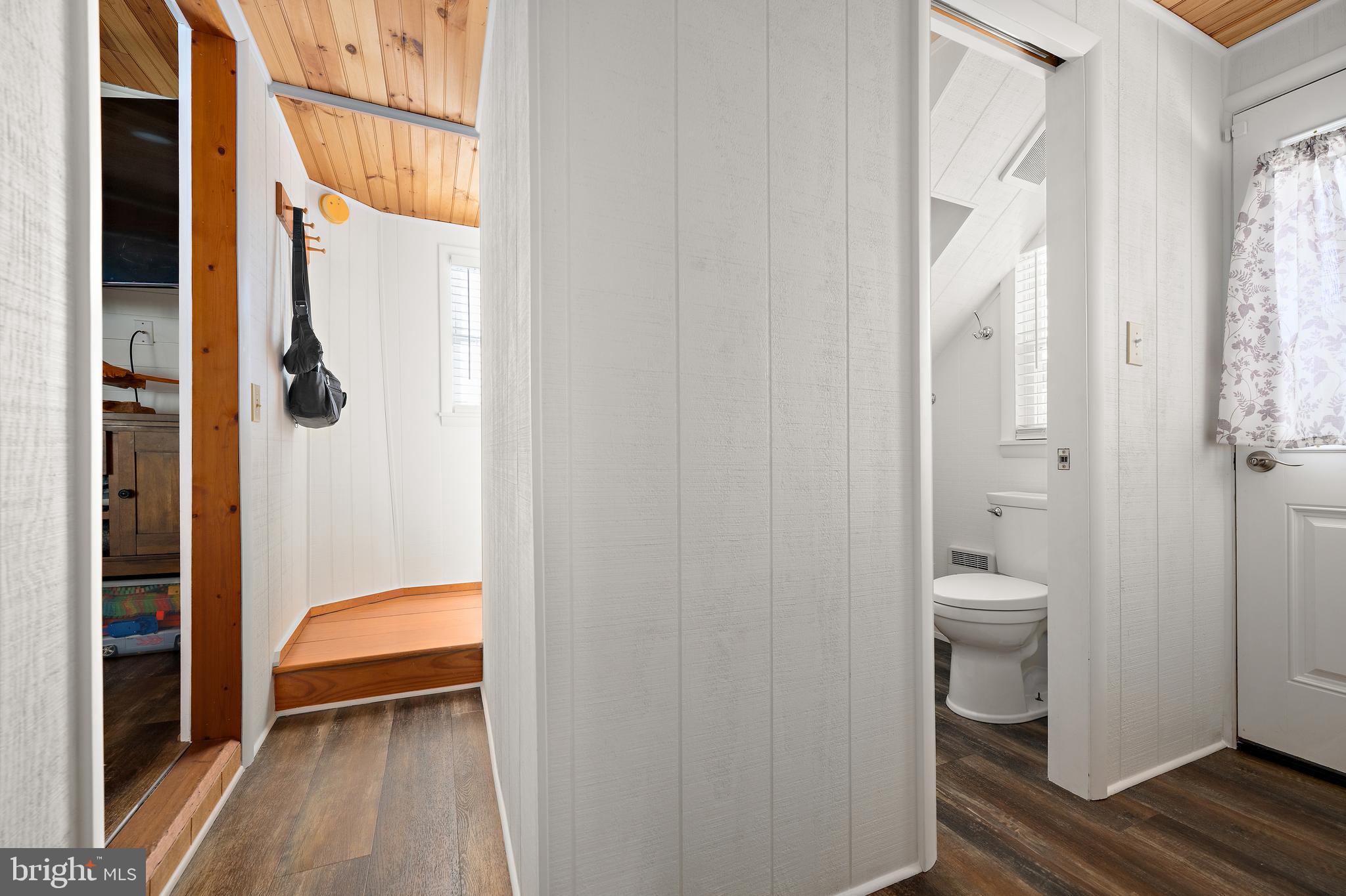 8 Virginia Avenue Milton, DE 19968 - Photo 17 of 50 a view of a bathroom from a corridor
