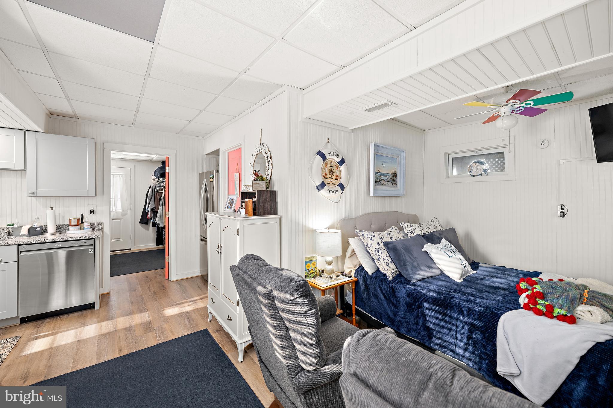 8 Virginia Avenue Milton, DE 19968 - Photo 39 of 50 a living room with furniture and kitchen view