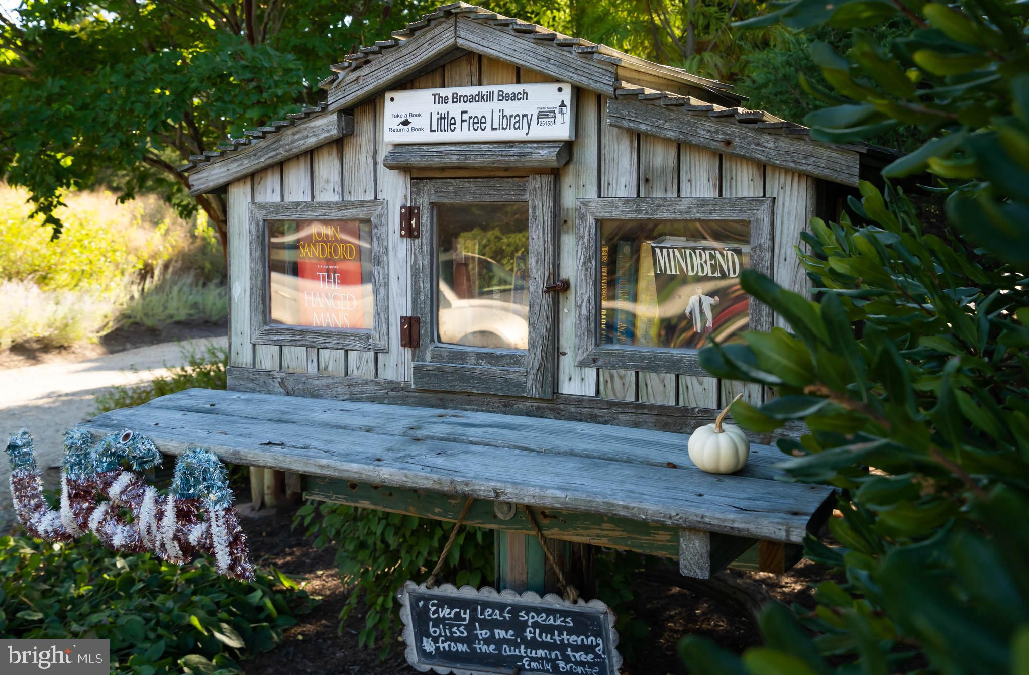 8 Virginia Avenue Milton, DE 19968 - Photo 48 of 50 a view of a wooden bench next to a building