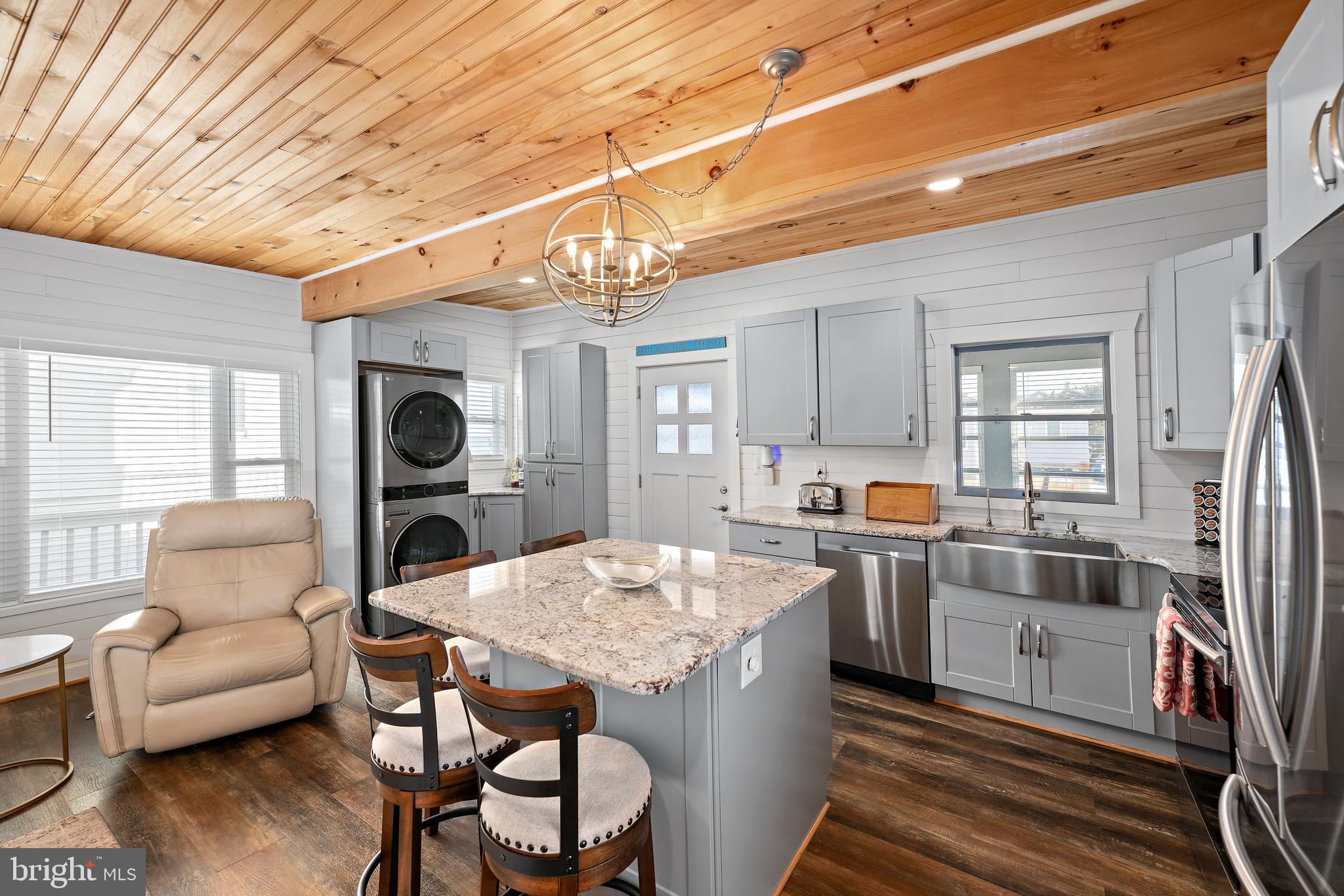 8 Virginia Avenue Milton, DE 19968 - Photo 6 of 50 a living room with stainless steel appliances furniture stove and a table