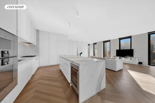 a living room with furniture large window and flat screen tv