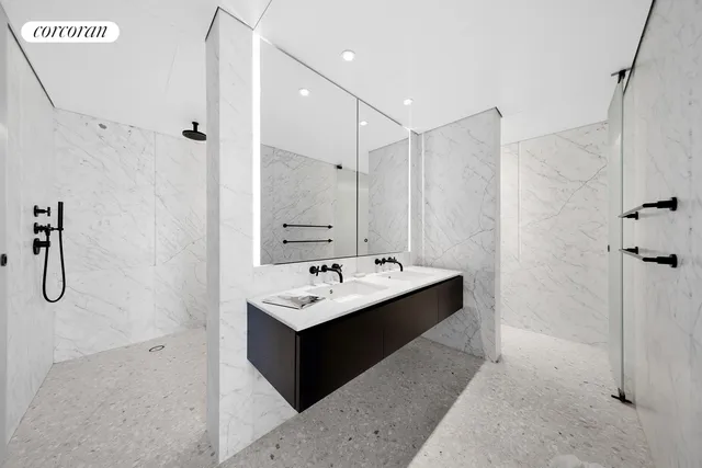 a bedroom with a large bed and a large window