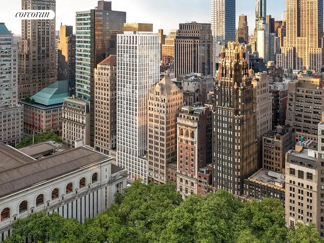 a view of city with tall buildings