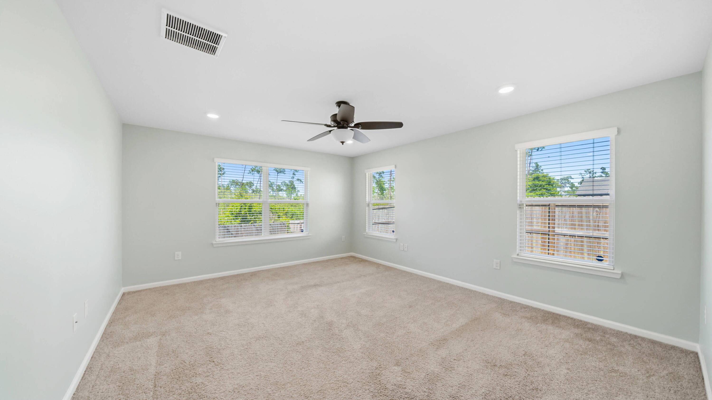 3927 Alva Thomas Road Panama City, FL 32404 - Photo 12 of 46 a view of an empty room with a window