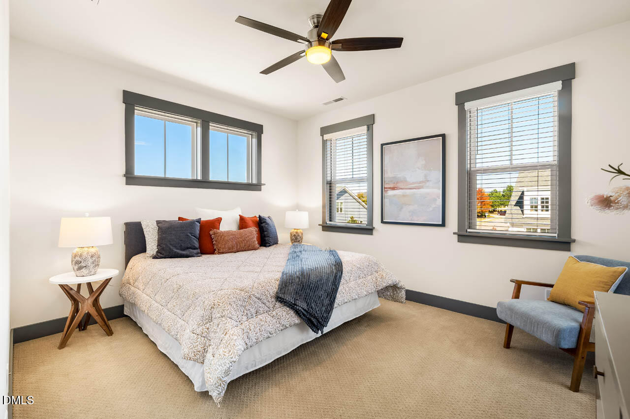 260 Quarter Gate Trace Chapel Hill, NC 27516 - Photo 22 of 68 a bedroom with a bed and a couch