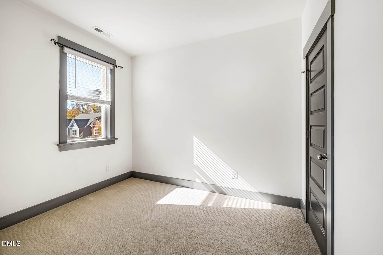 260 Quarter Gate Trace Chapel Hill, NC 27516 - Photo 30 of 68 an empty room with windows