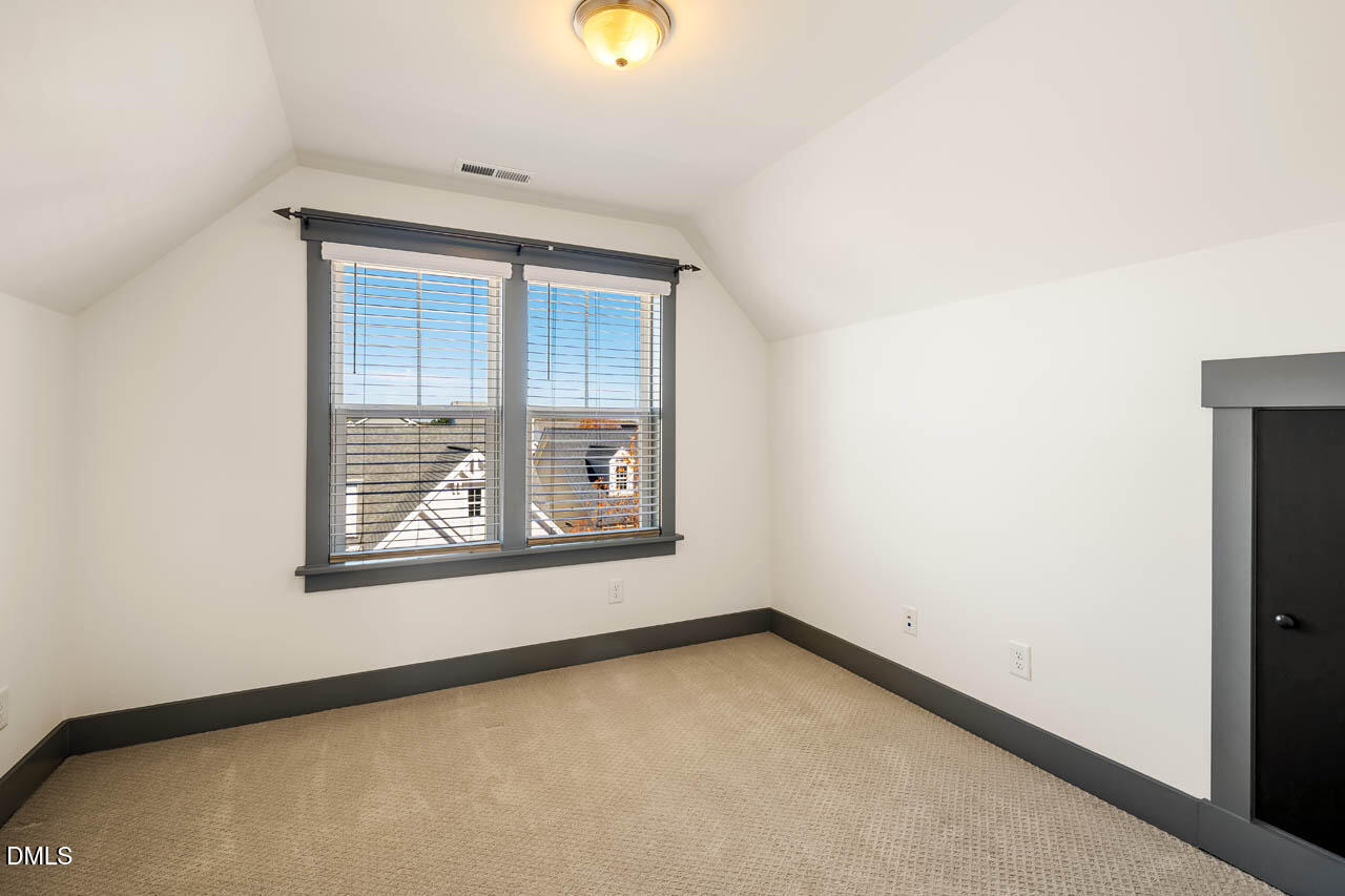 260 Quarter Gate Trace Chapel Hill, NC 27516 - Photo 31 of 68 an empty room with a window