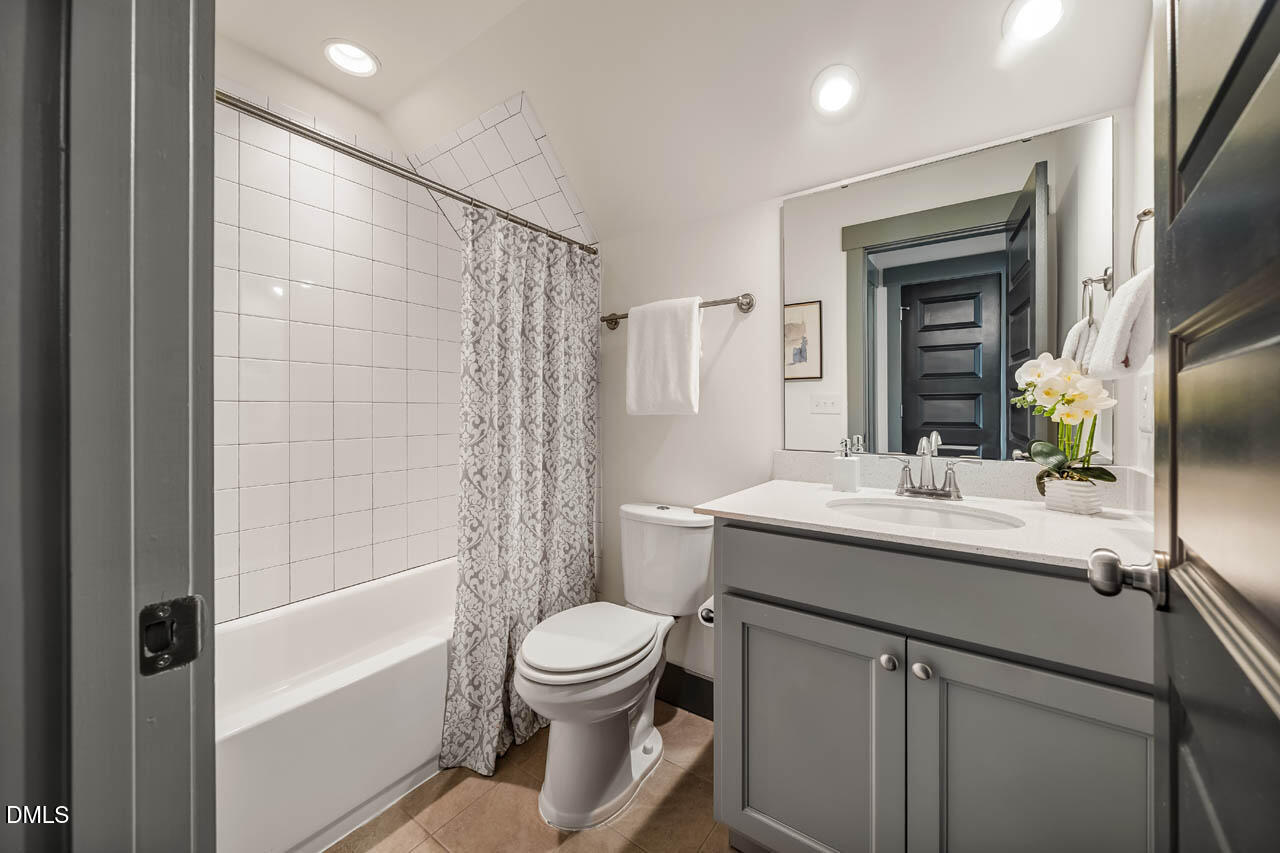 260 Quarter Gate Trace Chapel Hill, NC 27516 - Photo 32 of 68 a bathroom with a sink a toilet and shower