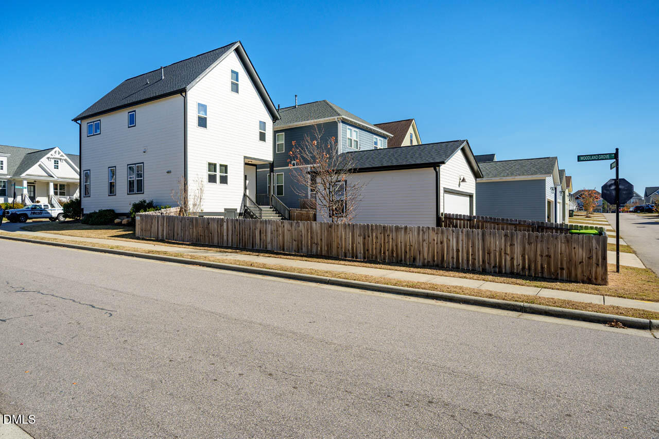 260 Quarter Gate Trace Chapel Hill, NC 27516 - Photo 40 of 68 a view of a house with a yard